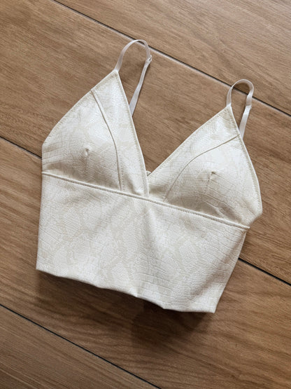 Top cropped ecopelle snake