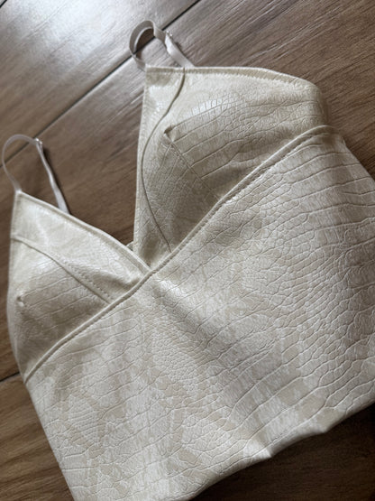 Top cropped ecopelle snake